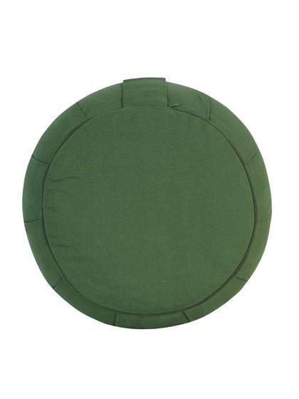 A top-down view of the green meditation cushion, highlighting its shape and handle.