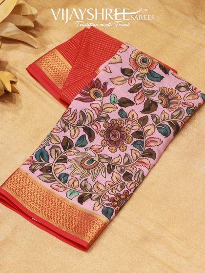 Another color variation of the Mysore silk with a Kalamkari border, this time in pink and red, perfect for vibrant celebrations.