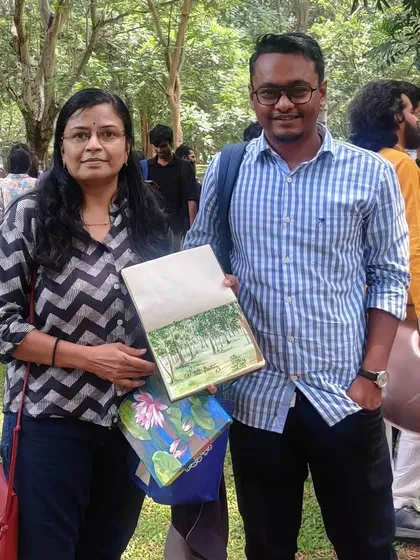 A photo with a fellow artist. The community is what makes these events so special.