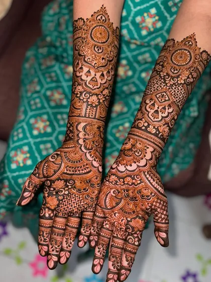 Another view of a stunningly intricate engagement design, filled with dense, traditional patterns.