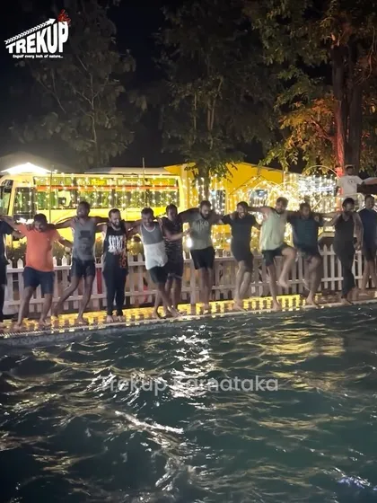 Fun times at the resort pool in Dandeli, with the group enjoying a break from trekking.