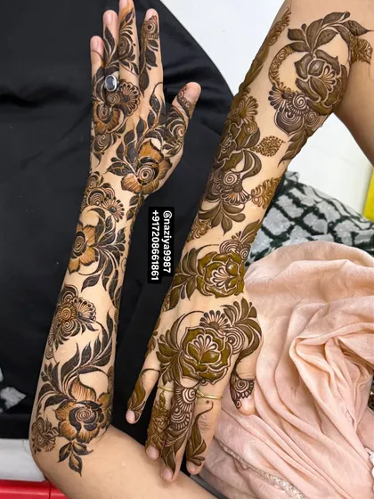 A lovely mix of styles, with one arm featuring bold, dark florals and the other showcasing a more delicate, shaded design. This shows how I can customize looks for different guests at the same event.