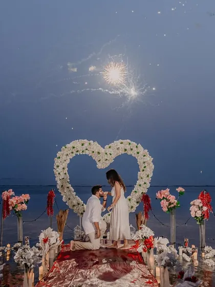 The perfect surprise proposal, complete with fireworks and a heart of flowers on the water. I specialize in capturing these once in a lifetime moments, ensuring the surprise, joy, and romantic setup are remembered forever.