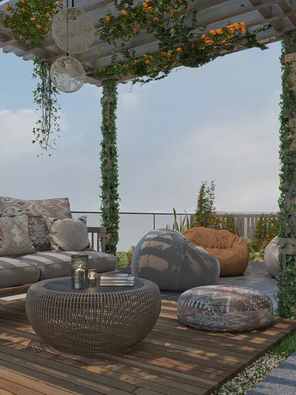 This perspective shows the complete seating area, including comfortable bean bag chairs on the lawn section. The design blends different types of flooring, from wood decking to artificial grass, to define zones and add visual interest.