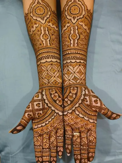 A gorgeous full-arm design with a mix of geometric and floral patterns. The symmetry and detail make this a true work of art.