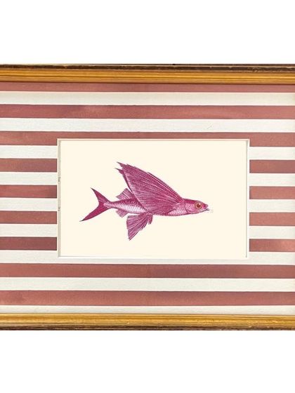 A whimsical illustration of a flying fish, framed with a hand-painted brown and white striped mount. The playful combination of art and frame creates a unique and charming piece.
