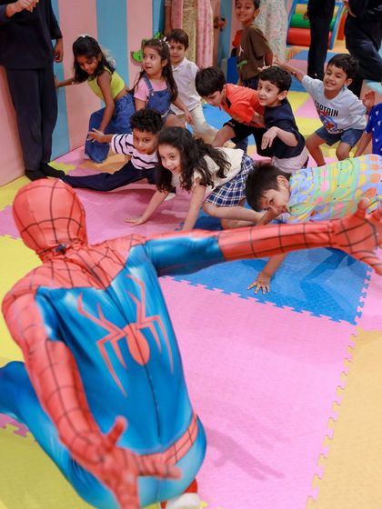 Spider-Man leads a group of kids in a fun, interactive game. Our character performers are experts at engaging children and leading them in themed activities.