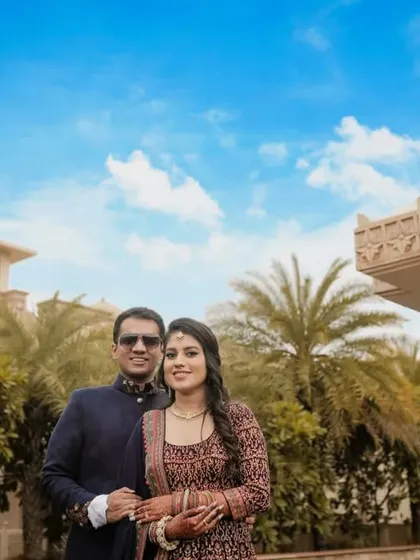 A portrait of the couple against a brilliant blue sky. We love using the natural environment to create vibrant and happy images that stand out.