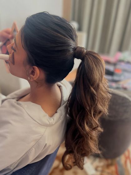 The final result, a beautiful and bouncy ponytail that is full of life.