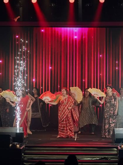 A family performance using fans as props, with cold-sparkle pyrotechnics. I help with prop ideas and production to make acts visually stunning.