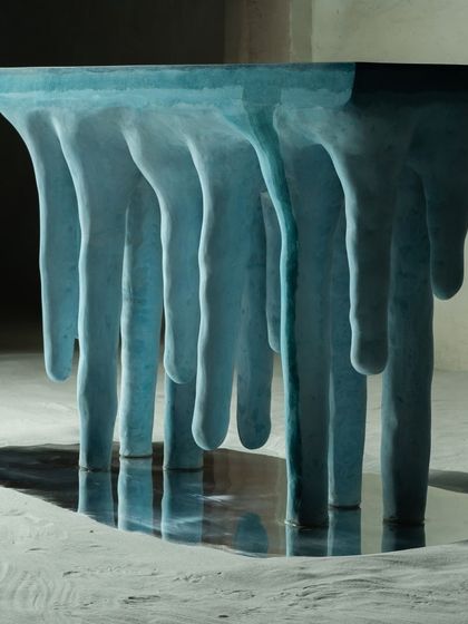 A different angle of the Ice Bloom console, highlighting the seamless transition from the flat tabletop to the flowing, icicle-like legs. This piece is a reflection of nature's beauty, handcrafted to bring a sense of tranquility and wonder indoors.