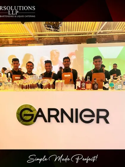 A frontal view of our clean and professional bar setup for the Garnier product launch. We work with brands to ensure our bar design is perfectly integrated with the event's aesthetic.