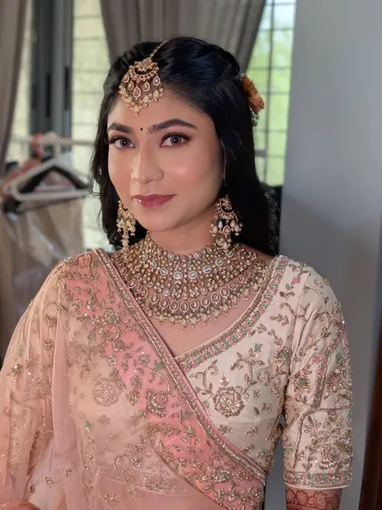 My glowing bride Rashi, looking absolutely radiant for her wedding. This look is a testament to the fact that you don't need heavy makeup to be a breathtaking bride.