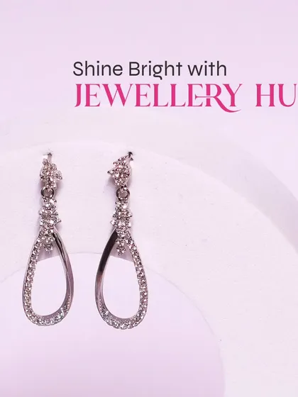Shine bright with these elegant teardrop-shaped loop earrings. They are simple, sophisticated, and perfect for any occasion.