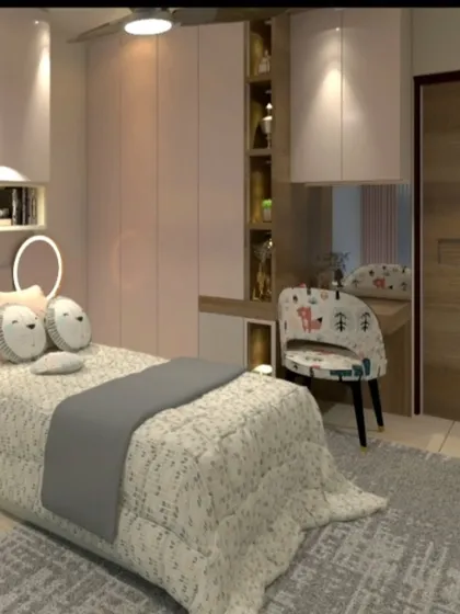 A charming girl's bedroom with a pink and white color scheme. The design includes a custom wardrobe with an integrated dressing table and cute, animal-themed decor.