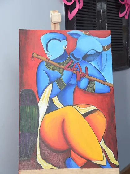 A stunning canvas painting of Lord Krishna by one of our talented students. This piece showcases the depth of skill and cultural inspiration that we nurture in our advanced painting classes, blending modern techniques with traditional themes.