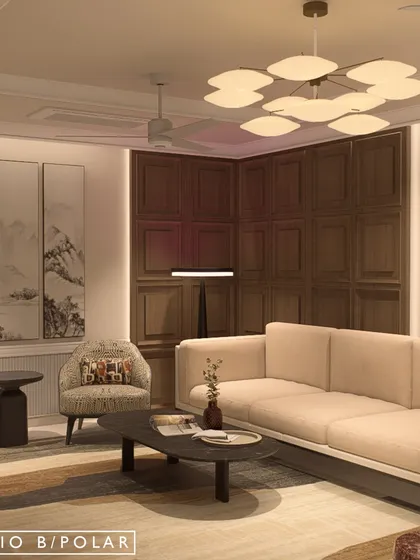 This view shows the cohesive design of the living area, where different seating arrangements are unified by a consistent color palette and a blend of textures, from wood paneling to soft upholstery.