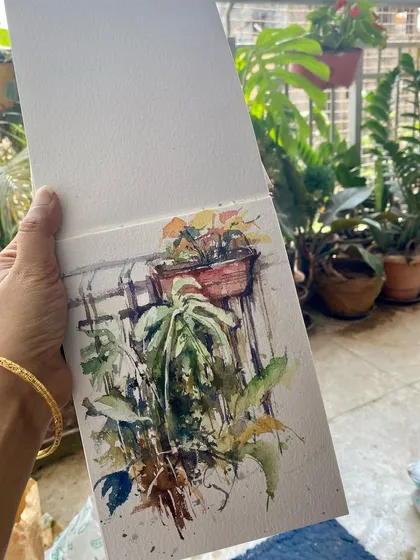 A quick watercolor sketch of my cozy balcony garden, done while sipping my morning tea. This is my cherished "me time" before the day begins.
