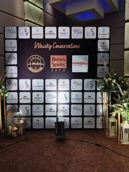 We create professional, media-ready backdrops for networking events and product showcases. This step-and-repeat banner for a "Whisky Conversations" expo provides a branded photo opportunity for sponsors and guests, adding a polished touch to the event.