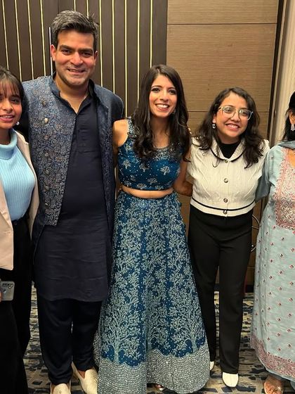 From online sessions to event day rehearsals, this wedding was a great experience. A picture with the happy couple and family.