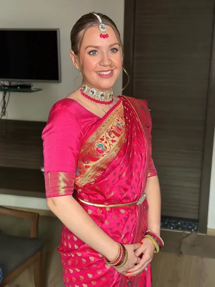 A happy, smiling bride, comfortable and beautiful in a culture not her own. It was a joy to create this look for her.
