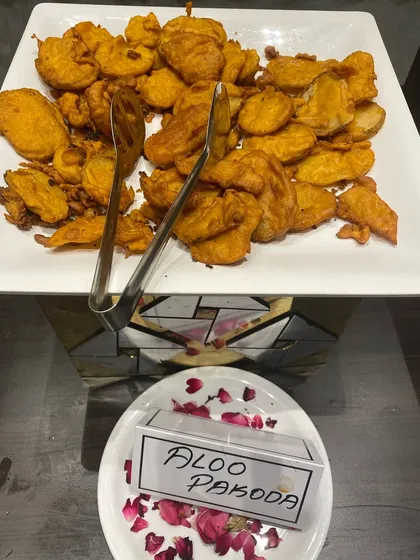 Classic Aloo Pakoda, made with thinly sliced potatoes, a simple and beloved tea-time snack.