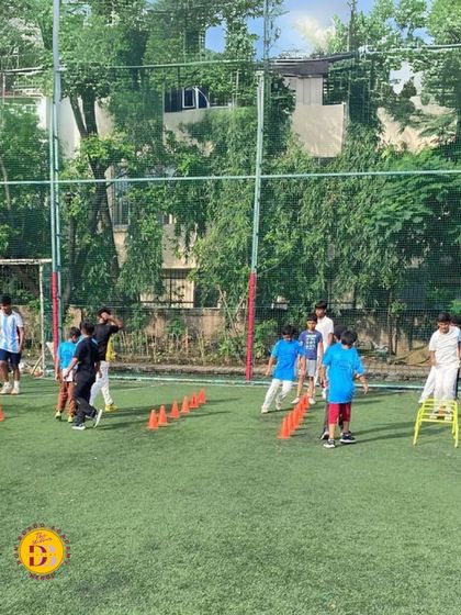 Players navigate an obstacle course during our fitness program. These drills are designed to improve agility, coordination, and overall athletic performance.