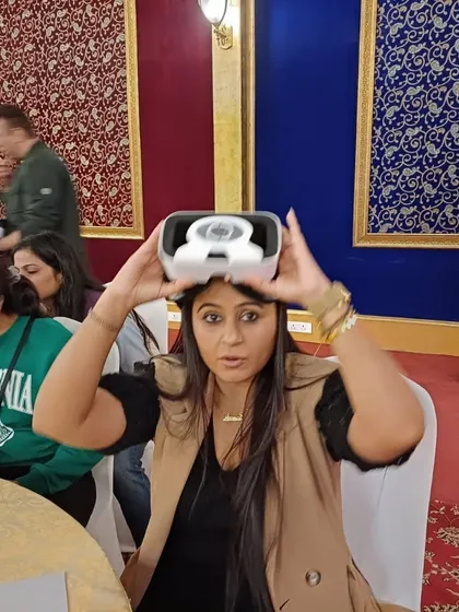 A participant fully immersed in our VR-based team-building activity. We use technology like this to create unique, memorable experiences that break the monotony of typical corporate training and genuinely excite the team.