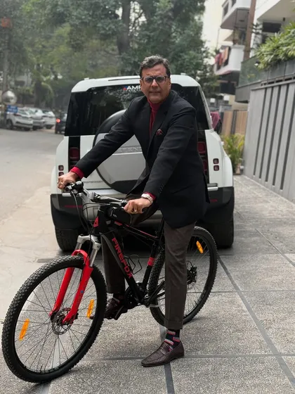 Embarking on the first working day of a new year on a bicycle. It serves as a personal reminder that the path to success is paved with humility, hard work, and honesty.