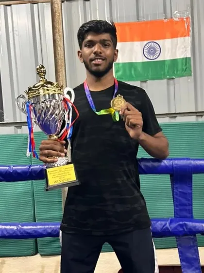 The result of hard work. One of our fighters with his gold medal and winner's trophy after a tough victory at the Bengaluru University Inter-college Boxing sports event. This is the pride of Thunder Martial Arts.
