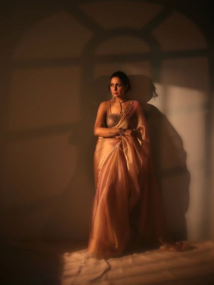 Here, we played with shadows to add depth and mystery. The gobo light effect mimics window light, casting an interesting pattern that makes this cinematic portrait more dynamic and intriguing.