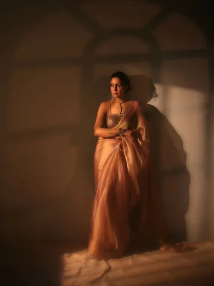 Here, we played with shadows to add depth and mystery. The gobo light effect mimics window light, casting an interesting pattern that makes this cinematic portrait more dynamic and intriguing.