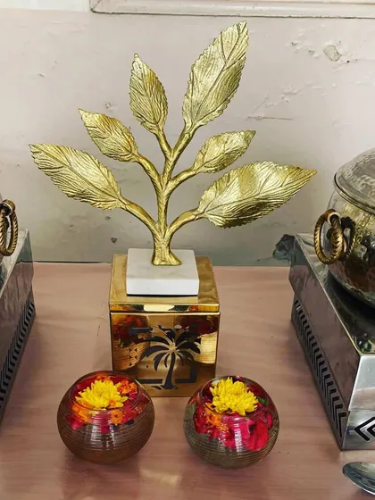 A close-up of the elegant golden decor pieces my team uses to adorn the buffet tables. These small details make a big difference in the overall look and feel.