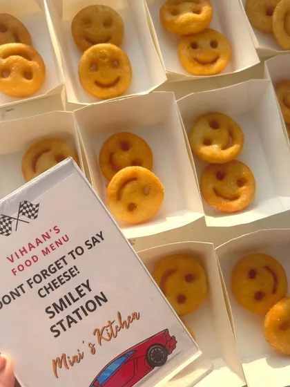A party isn't complete without some smiles, and my Smiley Station is a guaranteed hit. For this car-themed birthday, we set up a dedicated station with crispy smiley fries that had kids and adults coming back for more.