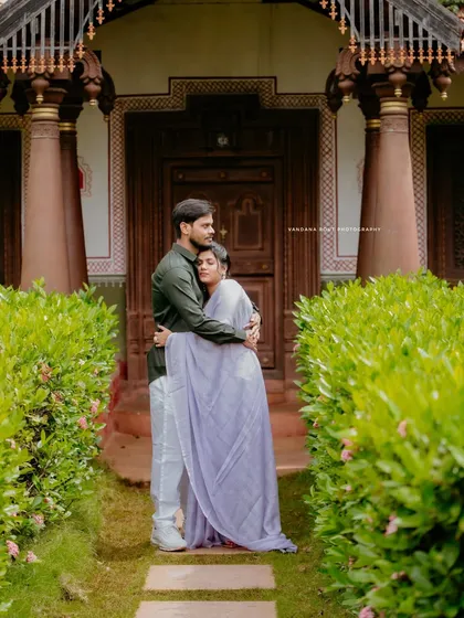A quiet moment on a rocking chair at a heritage resort. This setting is perfect for capturing a relaxed and timeless pre-wedding photo, surrounded by greenery.