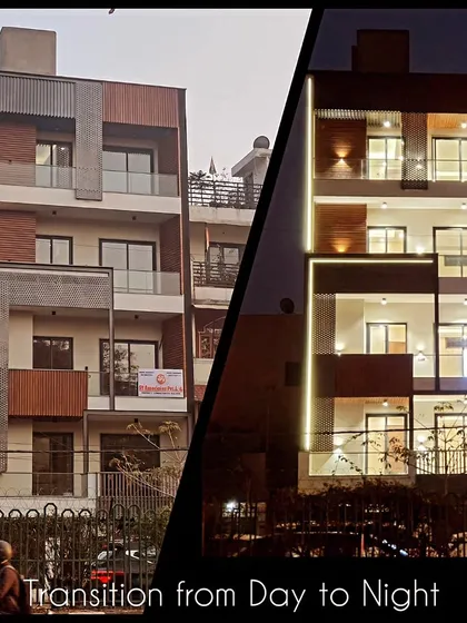 This split-screen view demonstrates the dramatic transformation of a residential facade from day to night. We use strategic architectural lighting to accentuate the clean lines, wooden charcoal panels, and MS screens, ensuring the building's aesthetic is powerful around the clock.