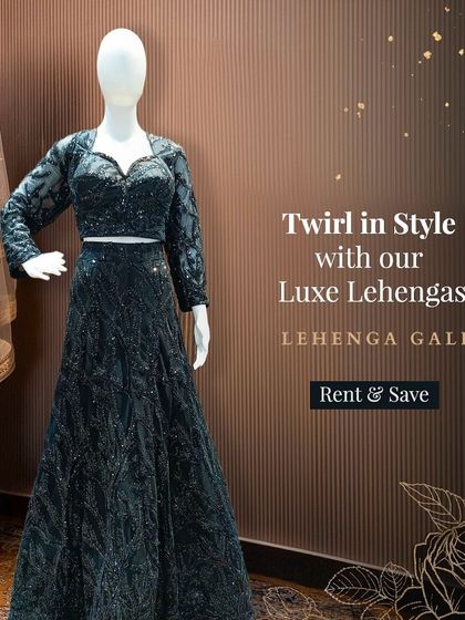 Twirl in style with this luxe black lehenga. The full-sleeve embellished blouse and sparkling skirt make it a sophisticated choice for an evening reception.