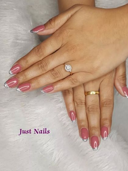 Another view of the elegant dusty rose and silver French tip design.