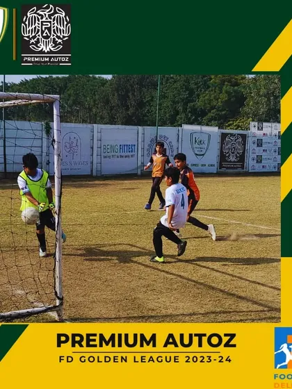 A goalkeeper makes a save during a tense moment in a Golden League game.