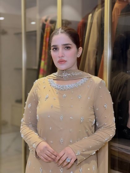 A close-up portrait of Shaista. This shot captures the clean lines of her makeup, from the perfectly groomed brows to the soft contour and subtle lip color.