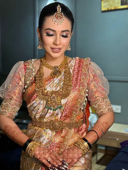 A serene, eyes-closed portrait showcasing the soft, blended eyeshadow and the overall elegance of the bridal look.