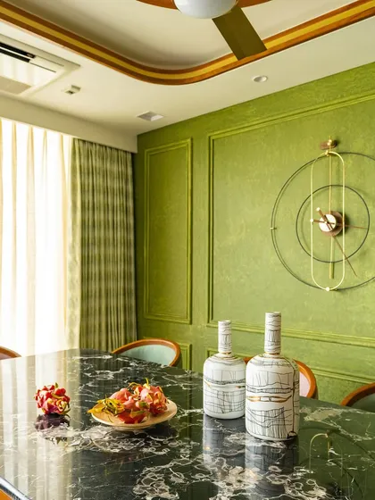 Another angle of the dining space, highlighting the interplay of light, color, and texture.