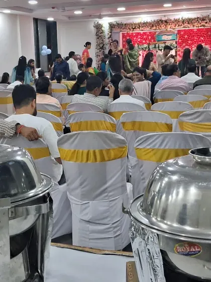 A view from the buffet station at a baby shower event. I can set up the food service without disturbing the main event area.