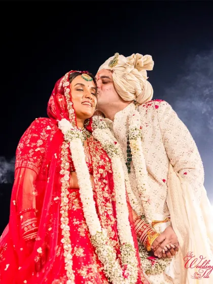 Beyond the grand decor and festivities, these are the moments we cherish. A quiet, tender kiss that speaks volumes, captured forever. We plan the big picture so you can live these small, precious moments.