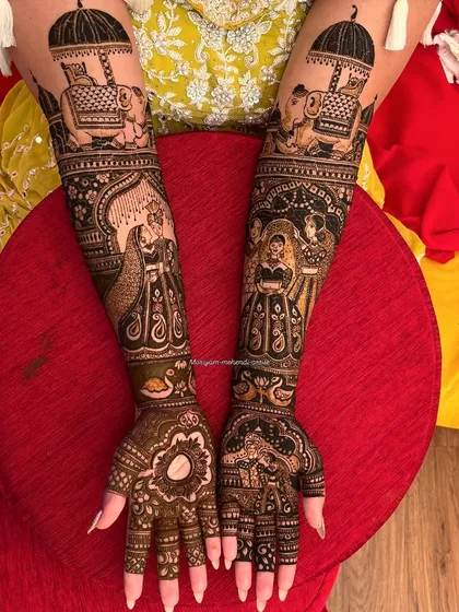 I love telling stories through my art. This traditional bridal mehendi features intricate figures, including a bride in her doli and majestic elephants, to make your design truly unique and personal.