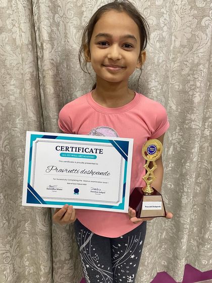 Pravrutti Deshpande from our Charni Road branch, happy after receiving her abacus prize.