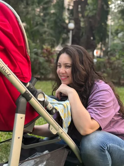 The postpartum journey is more difficult than pregnancy itself. I am blessed to have a supportive husband who has kept me sane through it all. This is a candid moment of joy with my baby, a reminder of the beautiful chaos of parenthood.