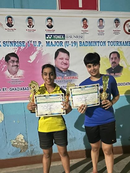 **U.P. Major U-19 Champions.** Divyanshi Gautam and Ridhima Singh celebrate their Gold medal win in the Girls' Doubles U-19 event.