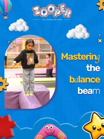Mastering the balance beam. A little champ shows off her skills on one of our soft play obstacles, building confidence with every step.