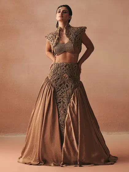 From my 'Cord Memory' collection, the Hilo lehenga showcases our signature handcrafted cord work. A structured zari jacket and placement embroidery on the skirt create a balance of texture and voluminous grace.